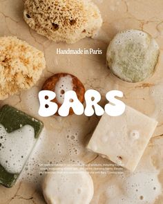 an advertisement for bar soaps with different types of bars on it and the words, handmade in paris