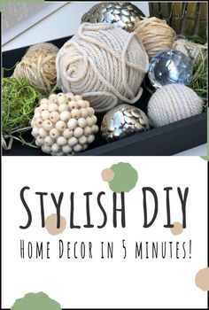 some balls of yarn are sitting in a black tray with text that reads stylish diy home decor in 5 minutes