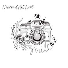 an ink drawing of a camera with the words, lene art last written below it