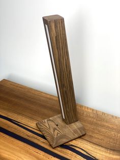 a wooden object on top of a wood table