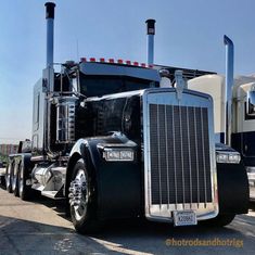 a large semi truck parked in a parking lot