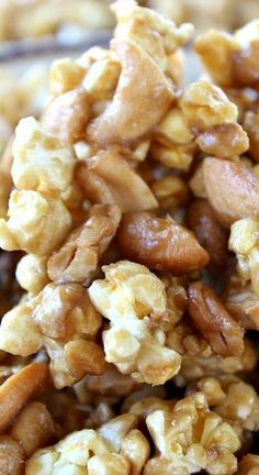 a close up view of walnuts on a spoon