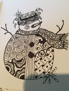 a black and white drawing of a snowman