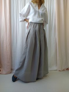 "Maxi linen skirt with pockets is perfect choice when you need casual, comfortable and stylish outfit combination. High waist linen skirt is clothing piece that can be easily paired with any top and creates a charming feminine look. Before placing an order, check the approximate measurements given below. If you are unsure about your size or would like to adjust the length of the item, you could leave your personal measurements (height, waist and hips) in a personalization box. SIZE and FIT Size Relaxed Fit Skirted Bottoms With Pockets, Bohemian High Waist Lined Maxi Skirt, Spring Baggy Lined Maxi Skirt, Bohemian Maxi Skirt With Elastic Waistband And Voluminous Fit, Bohemian Voluminous Maxi Skirt With Elastic Waistband, Bohemian Bottoms With Side Pockets For Spring, Bohemian High Waist Maxi Skirt With Elastic Waistband, Spring Bohemian Style Gathered Skirt Bottoms, Bohemian High Waist Maxi Skirt With Elastic