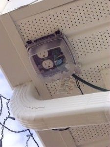 an electronic device is attached to the side of a building