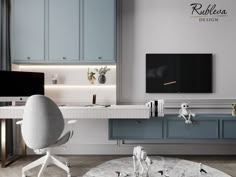 a living room with blue cabinets and a tv on the wall, in front of a white table