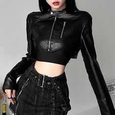 Get the perfect gothic, punk, or grunge look with this stylish Black Crop Faux Leather Jacket. Crafted from high-quality faux leather, it offers durability and comfort while adding functionality and glamour to your outfit. The cropped length and black color create a trendy and mysterious appeal, suitable for any occasion. Pair it with a crop top, skirt, or jeans, and complete the ensemble with boots and accessories for a confident and cool style. High-quality faux leather fabric Zip closure and Jackets Grunge, Womens Cropped Jacket, Cropped Faux Leather Jacket, Gothic Y2k, Hot Blouse, Leather Coats, Faux Leather Coat, Style Gothic, Streetwear Mode