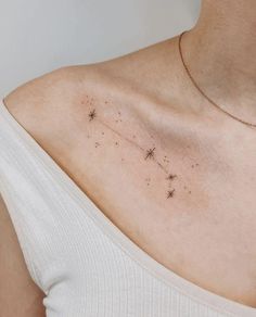 a woman's chest with stars on it