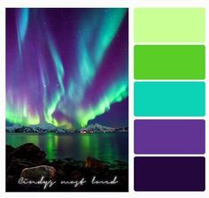 an image of the northern lights in purple, green and blue