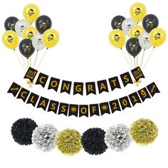 congratulations banner with black, white and gold balloons in the shape of footballs on it