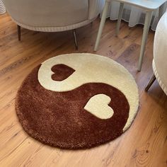 a brown and white rug on the floor in a living room