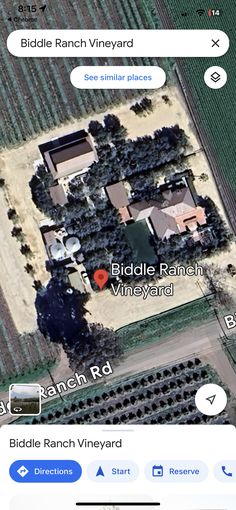 an aerial view of a house and land