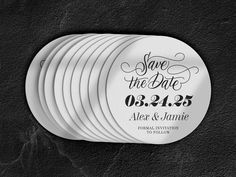 save the date magnets are stacked on top of each other in black and white