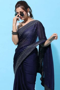 Product Features: Color: Navy Blue Fabric: Art Silk Work: Stone Embroidered Saree Length: 5.5 Meter Blouse Length: 0.80 Meter Style: Traditional Occasion: Festive Wash Care: Dry Clean Blouse Disclaimer: The last image gives a detailed look of the blouse piece that comes with this saree (The model is wearing a blouse from our in-house wardrobe) Disclaimer: There will be slight difference in digital to actual image One Minute Saree, Navy Blue Saree, Full Sleeve Blouse, Indian Designer Sarees, Plain Saree, Saree Blouse Patterns, Readymade Saree, Embroidered Saree, Ready To Wear Saree