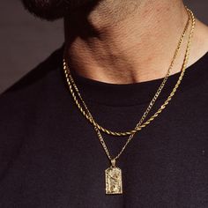 Your champion of justice. Remain authentic and real AF. The world can watch you, question you, even doubt you—The one thing they can’t do is stop you. ✓ 18K Gold & 316L Stainless Steel✓ Chain included with pendant✓ Water, Heat, Sweat Resistant✓ Hypoallergenic (No Green Skin) Included: 51cm Figaro Chain Included: 15mm x 25mm Pendant St Michael Necklace, Ice Necklace, Necklace Gold Pendant, Gold Figaro Chain, St Michael Pendant, Black Men Fashion Casual, Green Skin, Figaro Chain, Pearl Gemstone