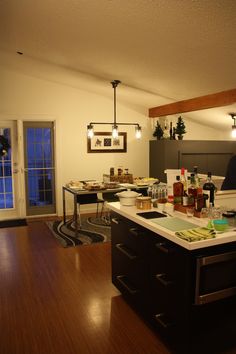 the kitchen is clean and ready to be used for dinner or wine tasting in someone's house