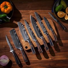 Save Over $200 When You Purchase the Entire 8-Piece Imperial Collection! Ships Next-Day from the USA with Tracked Shipping Masterfully forged from professional-grade High-Carbon Steel, the Imperial Collection features eight individually forged kitchen knives that are built to last so that you never need another kitchen knife set again. High-Carbon Steel, which was once the metal of choice of Japanese swordsmiths, has been exploding in popularity due to its added hardiness and sharpness, to such Kitchen Knife Design, Japanese Kitchen Knife, Metal Clothes Rack, Knives Kitchen, Fancy Kitchens, Japanese Kitchen Knives, Kitchen Knife Set, Clothes Rod, Cleaver Knife