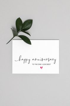 a card that says happy anniversary to the one i love best with a heart on it