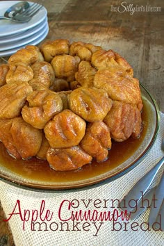 a bundt cake sitting on top of a plate covered in caramel glaze