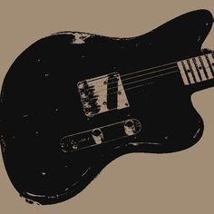 an old black electric guitar on a brown background