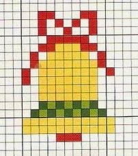 a cross stitch pattern with an image of a yellow and red hat on it's side