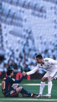 two soccer players are playing on the field