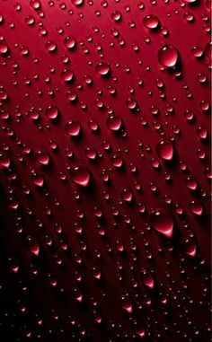 water droplets on a red background