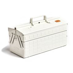 a large white box with handles on the top and bottom, sitting in front of a white background