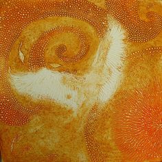 an orange and white painting with swirls on it's surface is shown in close up