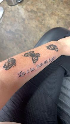 a woman with a tattoo on her arm that says, let it be, then let it go