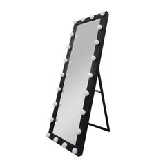 a black and white mirror with lights on it's sides next to a stand