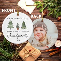 a christmas ornament with an image of a baby