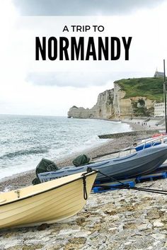 two boats sitting on the shore with text overlay reading a trip to normandy