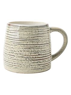 a white and black coffee mug with lines on it's side, sitting in front of a white background