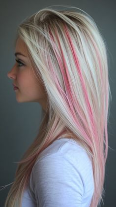 Add pastel pink peekaboo highlights to the back of your hair for a fun and unique look. Visit our page for tips on achieving this beautiful style. Save this pin for peekaboo highlight ideas! Tags: #PastelPinkPeekaboo #HairColor #UniqueLook Hot Pink Peekaboo Hair Blonde, Black And Rainbow Hair, Fun Blonde Hair Ideas, Blonde Hair With Pink Streaks, Pink Streaks In Blonde Hair, Blonde Hair With Pink Underneath, Blonde Hair With Color Peekaboos, Pink Peekaboo Highlights, Pink Peekaboo Hair