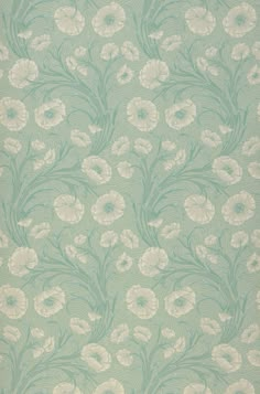 an old wallpaper with white flowers and green leaves