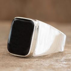 This prominent men's ring is the design of Zandra Lorena Sajbin. The wide high-polished band crafted of sterling silver features a bold rectangular stone of black Guatemalan jade. This ring will surely catch everyone's eyes. Single Stone Ring, Single Stone, Mens Ring, Men's Ring, Stone Ring, Statement Ring, Guatemala, Stone Rings, Statement Rings