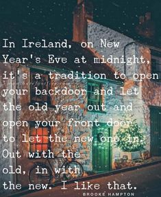 a brick building with a green door and a poem written on the front that says in ireland, new year's eve at midnight