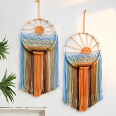 two wall hangings made out of macrame