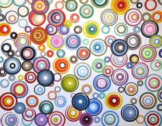 an abstract painting with many circles on it