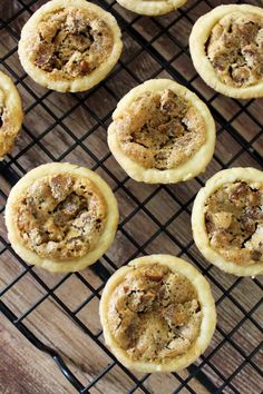 several cookies are cooling on a wire rack