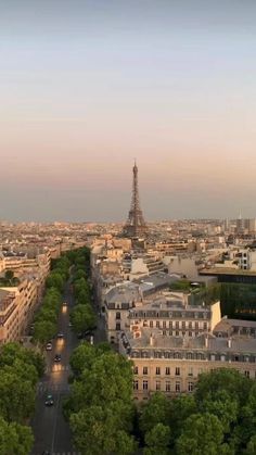 an aerial view of the eiffel tower and surrounding buildings in paris, france