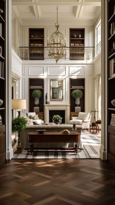 a living room filled with furniture and a chandelier