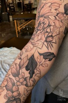 Shows an arm with fresh black linework tattoo of flowers, folliage and a spider. With black line details and shading. Tattoo Inspo, Tattoo Artist, Floral Designs