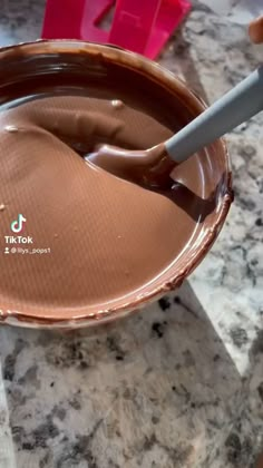 there is a spoon in the chocolate bowl