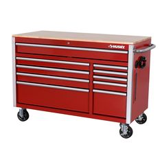 a red tool cabinet with two drawers on wheels