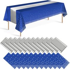 blue and silver tablecloths with white polka dots on them