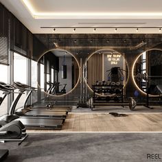 a gym with mirrors and treadmills in it