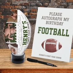 a birthday card with a football on it next to a pen and paper cup that says, please autograph my football