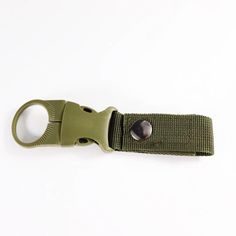 a pair of scissors is attached to a green strap